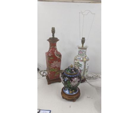 Two oriental 20th century lamps together with a Japanese cloisonne enamel lidded jar on a wooden plinthLocationIf there is no