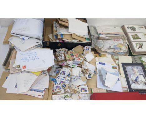 A collection of world stamps to include First Day covers, loose examples and others in albums Location:If there is no conditi