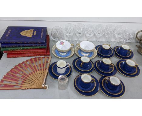 A mixed lot to include a set of T Goode & Co coffee cans with saucers, Spode, glassware to include a silver topped pot, a fan
