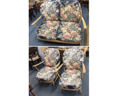 A mid 20th century Ercol blonde beech Windsor three piece sofa and two armchairsLocation:If there is no condition report show