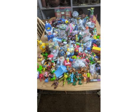 A large collection of children's toys to include Lego, Tom and Jerry, Teenage Mutant Ninja Turtles, Scooby Doo, Bugs Life and