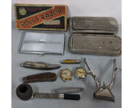 A mixed lot to include Rolls Razor, two gents watches, pen knives and other itemsLocation:If there is no condition report sho