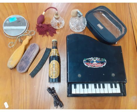 Vintage household items to include a mid 20th Century chrome topped and glass scent bottle and another, clothes brushes to in
