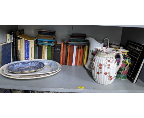 A mixed lot of glassware, books, ceramics, tools and other items to include wash jugs, silver plated and glass claret jug and