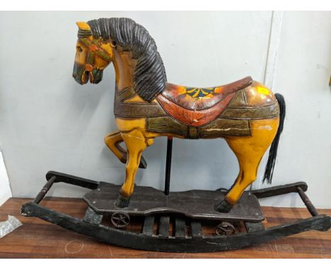 A late 20th century painted rocking horse on wheels A/FLocation: If there is no condition report shown please request