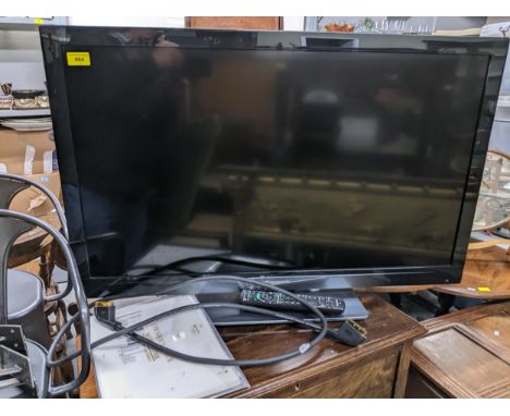 A Viera Panasonic 37" flat screen TV with remote and instruction manual Location:If there is no condition report shown, pleas