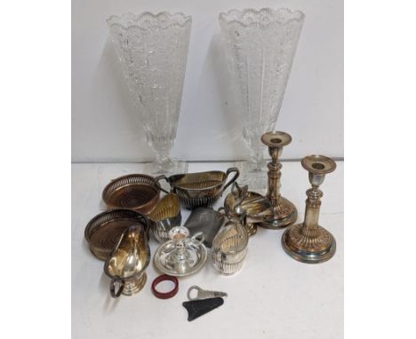 A mixed lot of mostly silver plate to include two sugar bowls, candlesticks, a pewter hip flask, a Worthington bottle opener,