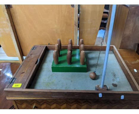 A vintage pub bar skittles game, pine framed with storage box for the skittles, the lid incorporating a cribbage board A/F Lo