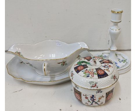 A group of Herend porcelain items to include an Imari style lidded jar, a Rosehip leaf pattern sauce boat and dish and a cand
