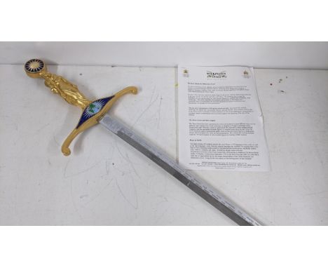 A Wilkinson commemorative Millennium sword, the gilt handle cast as the three grace, enamel decoration numbered 0001, with ce
