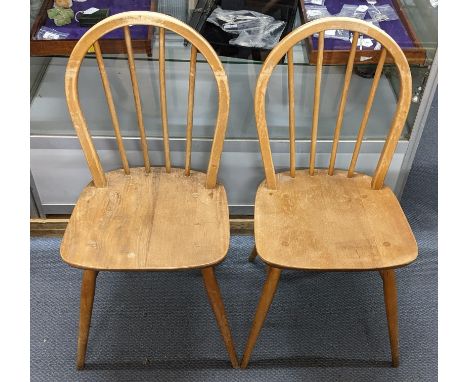 A pair of mid 20th century Ercol blonde elm and beech spindle back dining chairsLocation:If there is no condition report show
