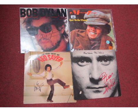 Four Signed (Unverified) LPs, to include Phil Collins, Michael Jackson, Bob Dylan and Leo Sayer.