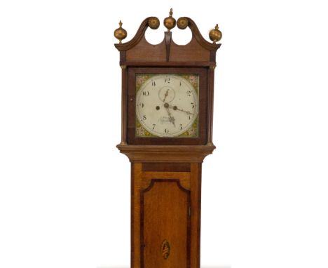 An early 19thC oak and mahogany crossbanded longcase clock, with swan neck pillared hood with ball and spike finales, shaped 