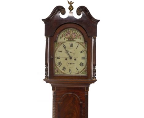 An early 19thC flamed mahogany longcase clock, with swan neck pediment, having brass roundel and eagle and ball spike to the 