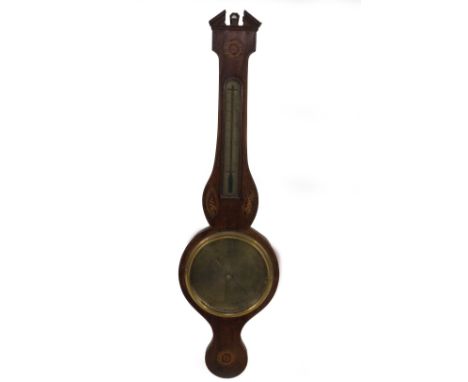 An early 19thC mahogany wheel barometer, with broken arch pediment, floral marquetry roundel over a silvered thermometer, ova