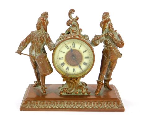 An Ansonia Clock Company late 19thC copper cased table clock, rococo brass dial with enamel chapter ring bearing Roman Numera