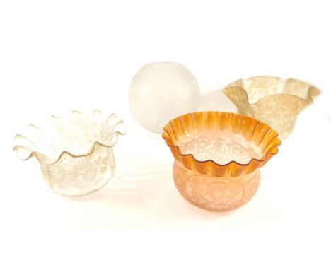 Four Victorian etched glass oil lamp shades, floral decorated. 