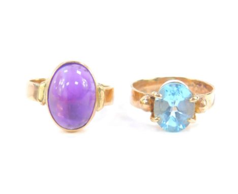 A 9ct gold and aquamarine ring, size K, and a 9ct gold and cabachon amethyst ring, size N, 7.5g.