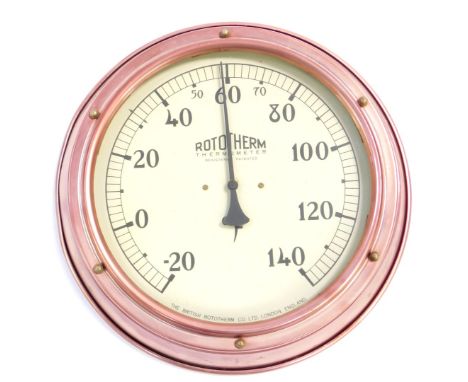 A British Rotiform circular cased wall mounted thermometer, 27cm Dia.