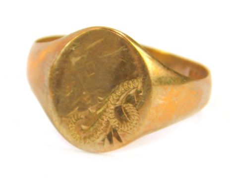 A 9ct gold gentleman's signet ring, foliate engraved, size S/T, 3.2g.