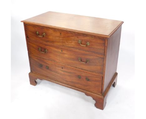 A late 18thC mahogany chest with moulded top and three long drawers on ogee bracket feet, 89cm high, 106cm wide, 54cm deep.