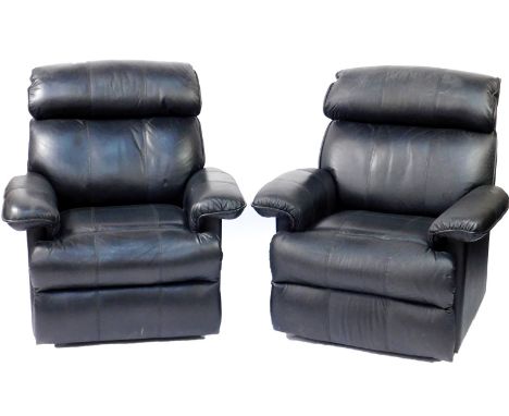 A pair of black leather manual recliner armchairs, 103cm H, 94cm W, 76cm D.
