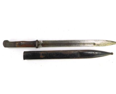 A German bayonet, engraved indistinctly to the blade, with scabbard, 46cm L.