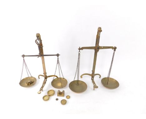 A pair of Victorian brass and steel silver scales, by Vandome Titfords and Pawson, London, 54.5cm H, further set of silver sc