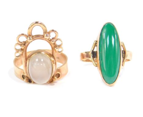 A 9ct gold and moonstone ring, in an abstract design, size Q, and a 9ct gold and malachite ring, size N, 9.2g. (2)