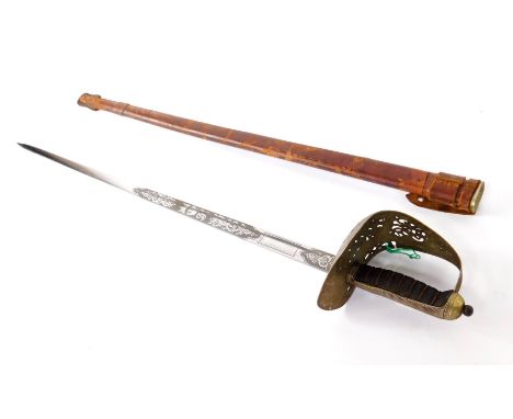 A George V infantry sword, with a brass hilt and wire bound shagreen grip, with scabbard, blade 83cm L. 