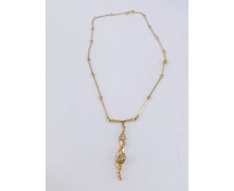 An 18ct gold diamond and crystal pendant, on a fancy link chain, with bolt and T bar fitting, diamond approx 1/4ct, 15.8g.
