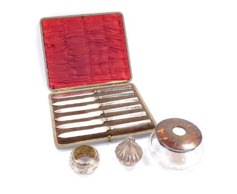 A George V cut glass hair tidy with silver and tortoise shell lid with pique decoration, Birmingham 1922, six silver handled 