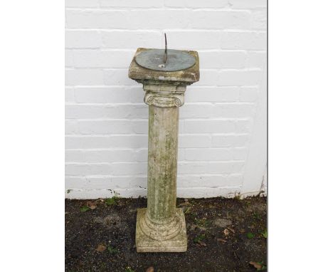A concrete and brass sundial, of Doric column form, 91.5cm H.
