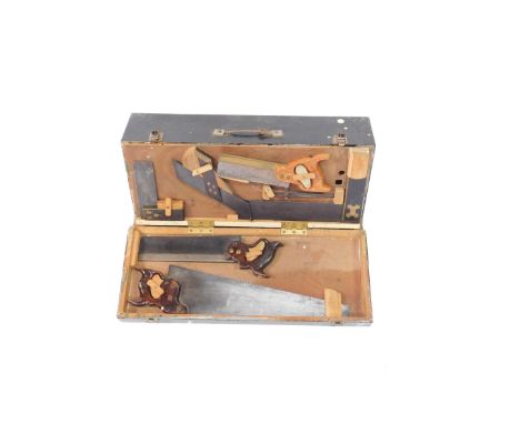 A black painted pine tool chest, containing carpenter's tools, 39.5cm H, 68.5cm W.