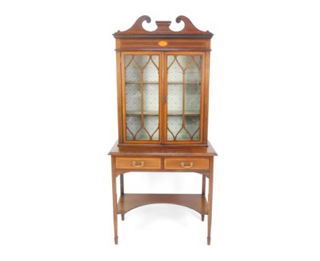 An Edwardian mahogany Sheraton revival display cabinet, with swan neck pedimented top set with oval patera over two astragal 