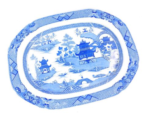 A Spode early 19thC blue and white meat platter, transfer decorated with a chinoiserie landscape, printed mark, 52.5cm W.