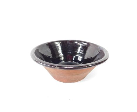 A vintage terracotta mixing bowl, brown glazed interior, 46.5cm W, 17cm H. 