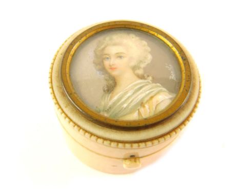 A continental 19thC ivory pot, of cylindrical form, with push button release to the lid, decorated with the bust portrait of 