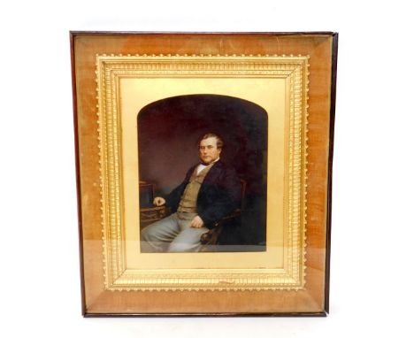 English School (19th C). Portrait of a seated gentleman at a desk, gouache and watercolour, framed and outer framed, 25.5cm x