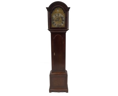 George Avenall of Farnham. An early 18thC flamed mahogany longcase clock, with moulded arched hood, with reeded pillars, full