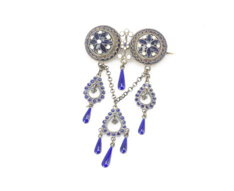 A Norwegian white metal and enamel Solje brooch, with blue and white roundel above filigree swags in blue enamel marked to re