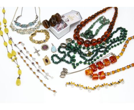 A quantity of silver gem set jewellery, including a matching ruby and silver earring and ring set, pebble amber bangle, mothe