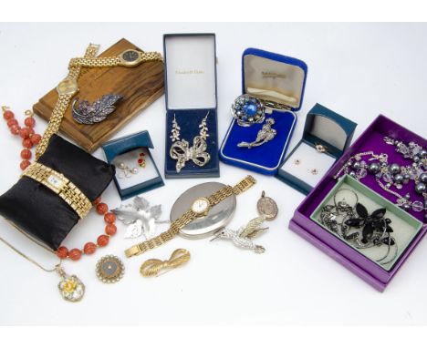 A quantity of costume jewellery, including an oval and enamel gold plated locket, an olive wood Jerusalem souvenir book with 