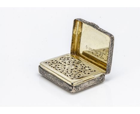 A George IV silver vinaigrette by Nathanial Mills, rectangular, 4.2cm, with engine turned exterior and hinged gilt grille to 
