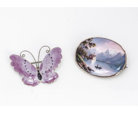 A 19th Century enamel yellow metal framed oval brooch, depicting Lake Constance, reverse with inscription Chateau Chillon, 4.