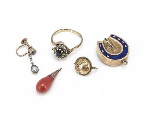 A novelty gold and enamel horseshoe shaped charm, with spinning roulette style wheel to reverse (af) circa 1860 together with