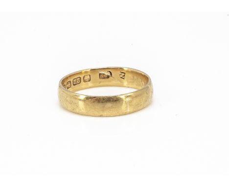 A 22ct gold wedding band, of flattened form, ring size K 1/2, 3.5g