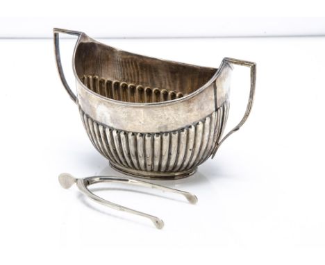 A late Victorian silver sugar basin by William Hutton &amp; Sons, together with a pair of wishbone shaped sprung sugar tongs,