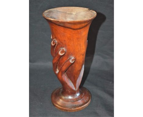 Tribal Art - a Pitcairn Island vase, carved with a hand, 24cm high, early 20th century