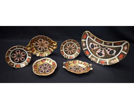 A Royal Crown Derby 1128 pattern crescent salad plate, first quality; others, similar, including a two-handled bon-bon dish, 